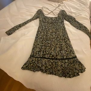 The dress is a floral mini dress, with the print as blue and yellow flowers!